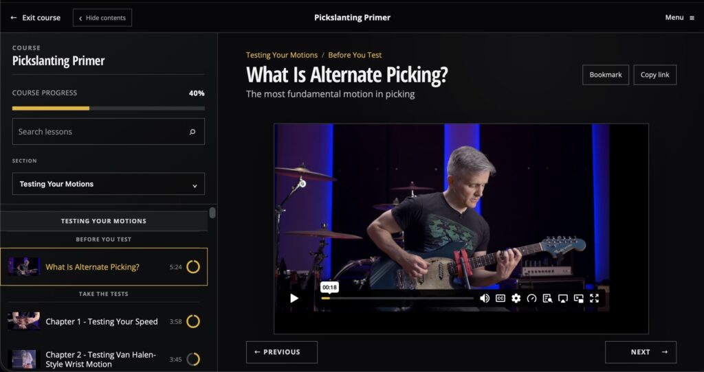 The Pickslanting Primer course player showing lesson navigation, progress tracking, and video playback